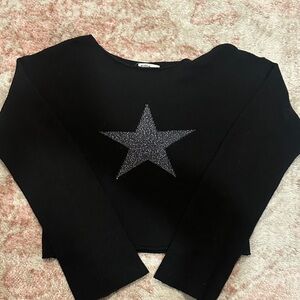 Subdued black sweater with silver glitter star⭐️